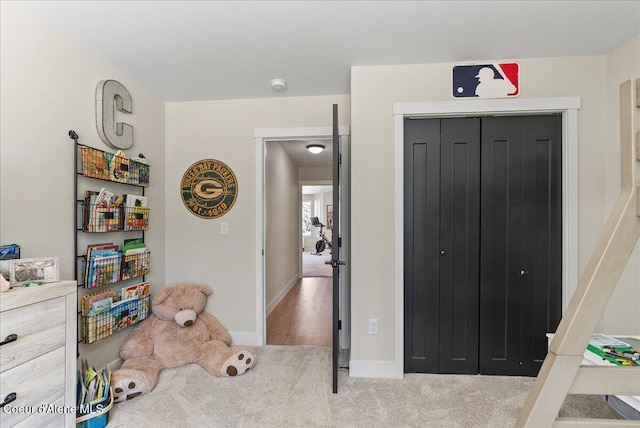 388 Wyatt Ln, Spirit Lake, ID 83869 - carpeted bedroom with a closet and baseboards
