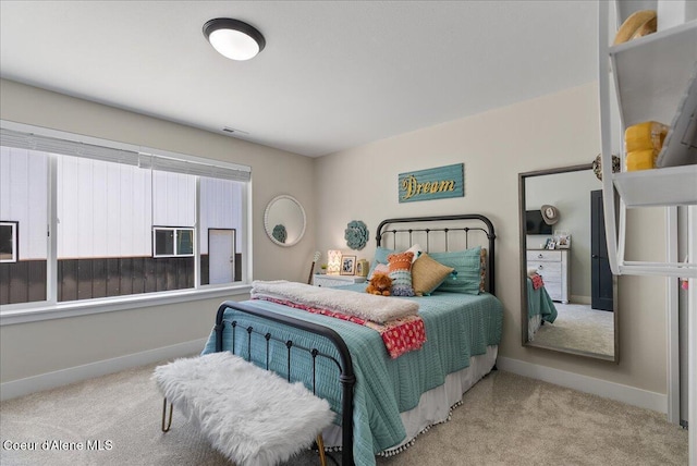 388 Wyatt Ln, Spirit Lake, ID 83869 - bedroom featuring baseboards and carpet