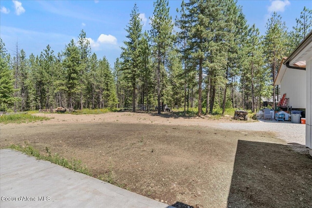 388 Wyatt Ln, Spirit Lake, ID 83869 - view of yard featuring a forest view