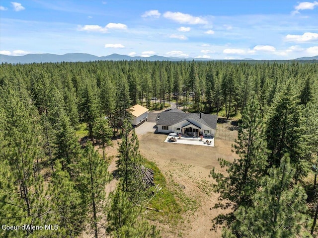388 Wyatt Ln, Spirit Lake, ID 83869 - view of subject property featuring a forest