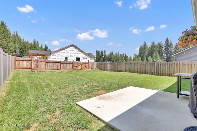 67 Bingham Way, Priest River, ID 83856 - fenced backyard featuring a patio area