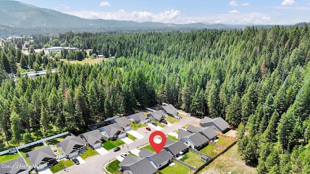 67 Bingham Way, Priest River, ID 83856 - aerial overview of property's location with a mountain backdrop and nearby suburban area