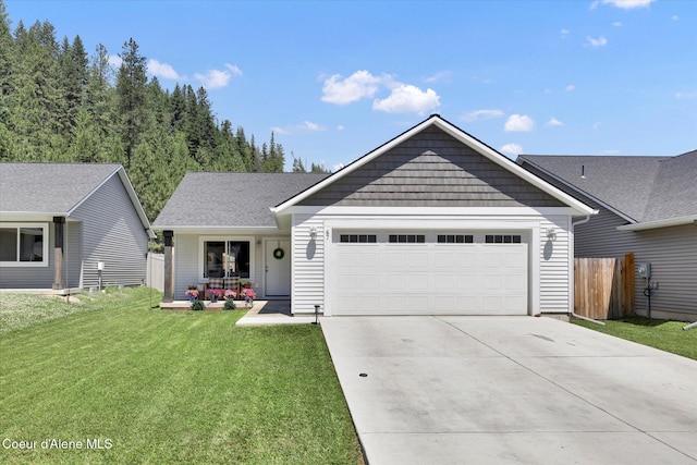 67 Bingham Way, Priest River, ID 83856 - view of front of property with a garage and driveway