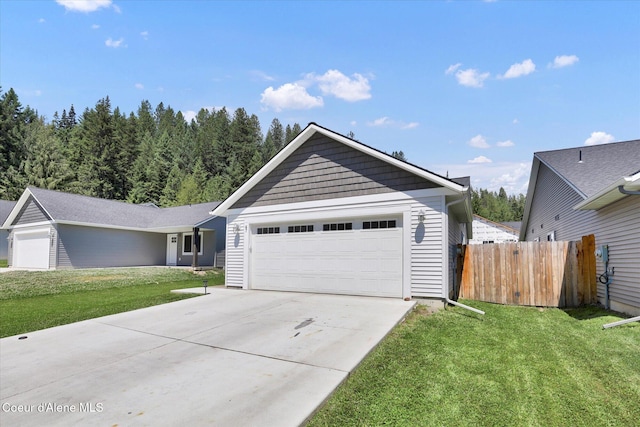 67 Bingham Way, Priest River, ID 83856 - ranch-style home featuring a garage and concrete driveway