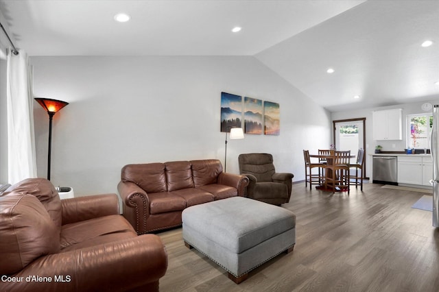 67 Bingham Way, Priest River, ID 83856 - living area with lofted ceiling, light wood-style floors, and recessed lighting