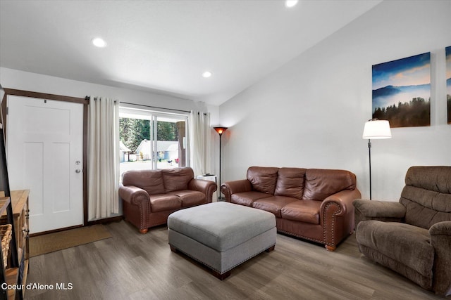 67 Bingham Way, Priest River, ID 83856 - living area with lofted ceiling, wood finished floors, and recessed lighting
