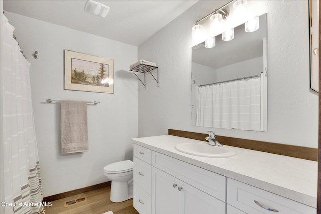 67 Bingham Way, Priest River, ID 83856 - bathroom with wood finished floors and vanity