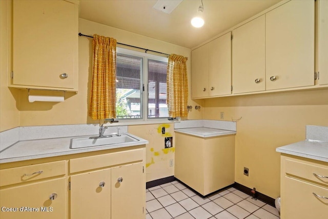 9603 N Strahorn Rd, Hayden Lake, ID 83835 - kitchen with light countertops and light tile patterned floors