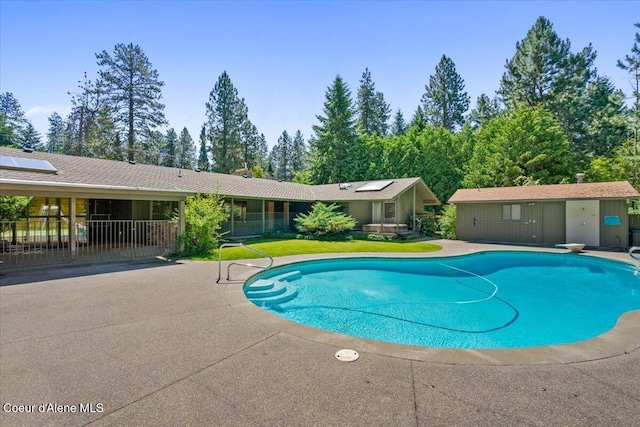 9603 N Strahorn Rd, Hayden Lake, ID 83835 - outdoor pool with a patio and a diving board