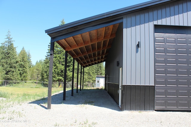 23426 N Massif Rd, Rathdrum, ID 83858 - view of home's exterior featuring board and batten siding and an outdoor structure
