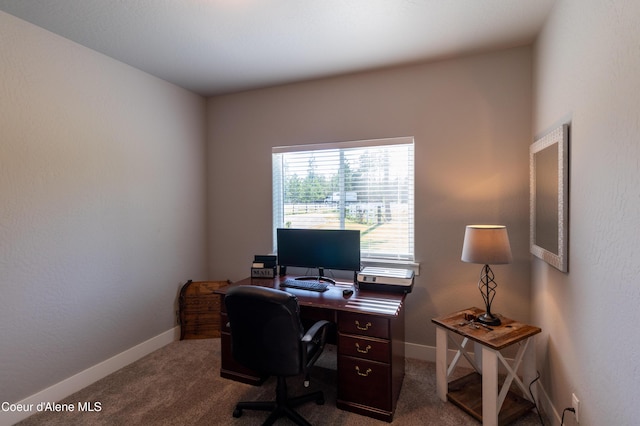 23426 N Massif Rd, Rathdrum, ID 83858 - office area featuring dark carpet and baseboards