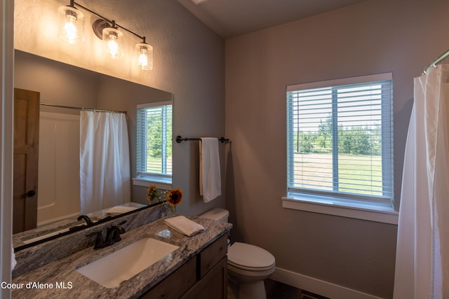 23426 N Massif Rd, Rathdrum, ID 83858 - bathroom featuring vanity, healthy amount of natural light, and a shower with shower curtain