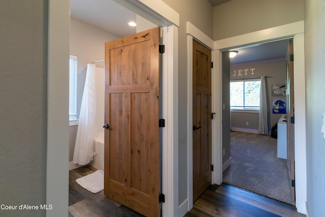 23426 N Massif Rd, Rathdrum, ID 83858 - corridor featuring wood finished floors and baseboards