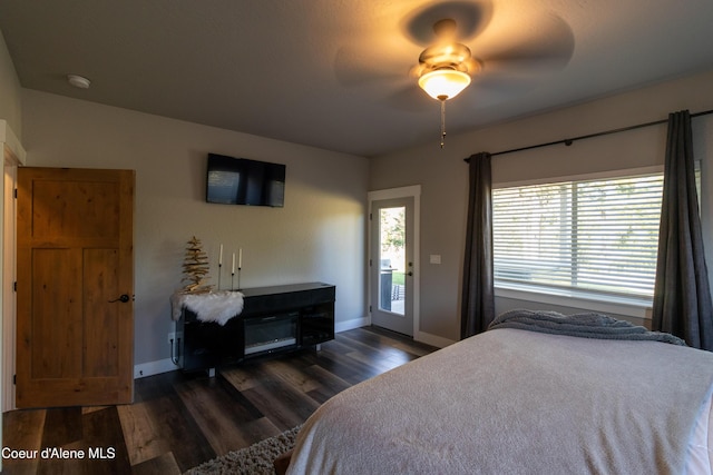23426 N Massif Rd, Rathdrum, ID 83858 - bedroom featuring dark wood-style flooring, ceiling fan, and access to exterior