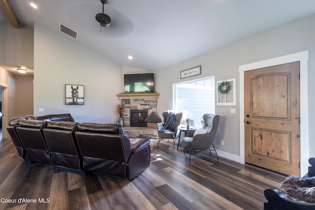 23426 N Massif Rd, Rathdrum, ID 83858 - living room featuring a stone fireplace, vaulted ceiling, dark wood-style floors, and recessed lighting