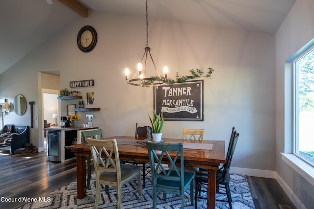 23426 N Massif Rd, Rathdrum, ID 83858 - dining space with dark wood-style floors, healthy amount of natural light, a chandelier, beam ceiling, and high vaulted ceiling