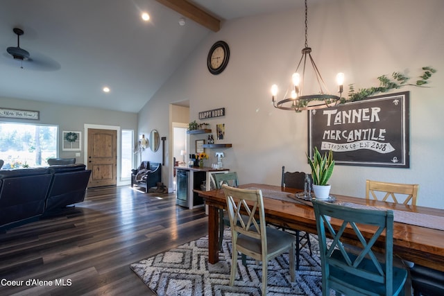 23426 N Massif Rd, Rathdrum, ID 83858 - dining area featuring a chandelier, beam ceiling, dark wood-style floors, high vaulted ceiling, and recessed lighting