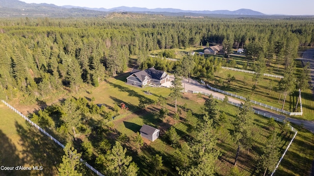 23426 N Massif Rd, Rathdrum, ID 83858 - drone / aerial view of a forest and a mountain backdrop