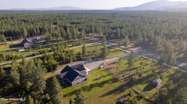 23426 N Massif Rd, Rathdrum, ID 83858 - aerial view of property's location featuring a heavily wooded area and a mountainous background