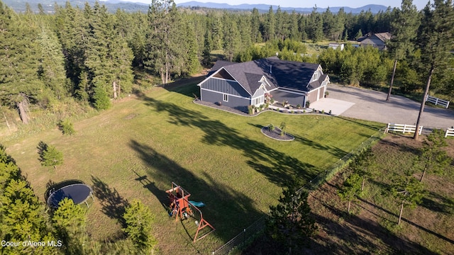 23426 N Massif Rd, Rathdrum, ID 83858 - view of subject property with a mountainous background and a heavily wooded area