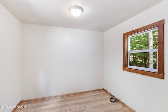 1053 Upper Pack River Rd, Sandpoint, ID 83864 - unfurnished room with light wood-type flooring and baseboards