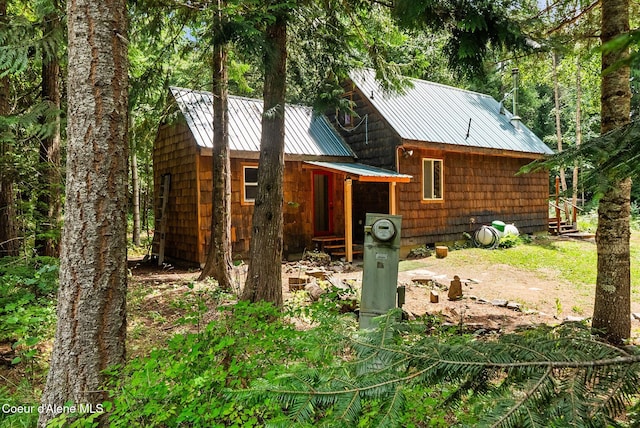 1053 Upper Pack River Rd, Sandpoint, ID 83864 - view of front of property with a metal roof