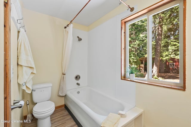 1053 Upper Pack River Rd, Sandpoint, ID 83864 - full bath with shower / bathtub combination with curtain and wood finished floors
