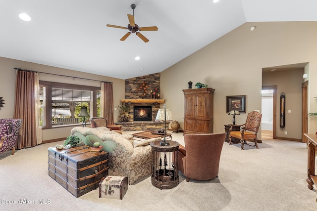 11477 N Rocking R Rd, Hayden, ID 83835 - living room with light carpet, ceiling fan, recessed lighting, a fireplace, and high vaulted ceiling