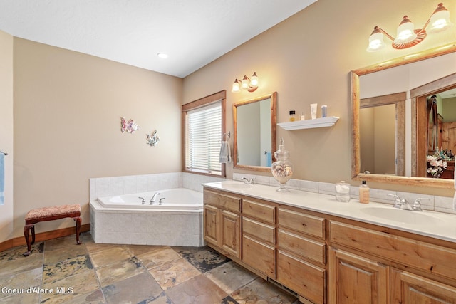 11477 N Rocking R Rd, Hayden, ID 83835 - bathroom with a garden tub, double vanity, and stone tile floors