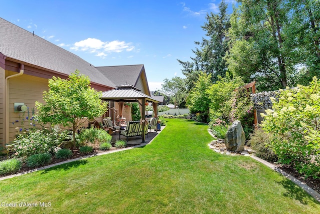 11477 N Rocking R Rd, Hayden, ID 83835 - fenced backyard with a gazebo and a patio