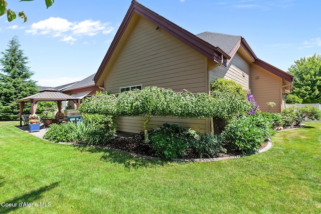11477 N Rocking R Rd, Hayden, ID 83835 - view of property exterior with a gazebo, a yard, a patio, and outdoor lounge area