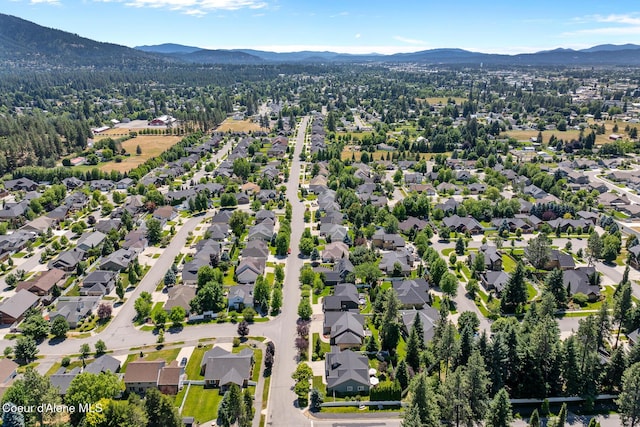 11477 N Rocking R Rd, Hayden, ID 83835 - aerial view of residential area featuring a mountainous background