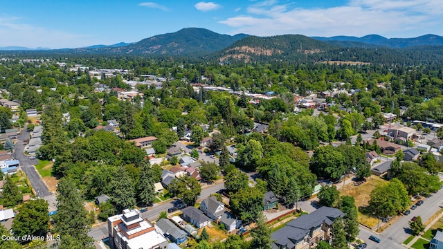 114 E Foster Ave, Coeur Dalene, ID 83814 - aerial perspective of suburban area with mountains and a heavily wooded area