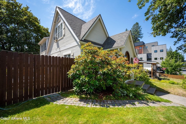 114 E Foster Ave, Coeur Dalene, ID 83814 - view of home's exterior with roof with shingles