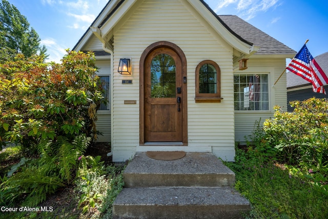 114 E Foster Ave, Coeur Dalene, ID 83814 - property entrance with a shingled roof