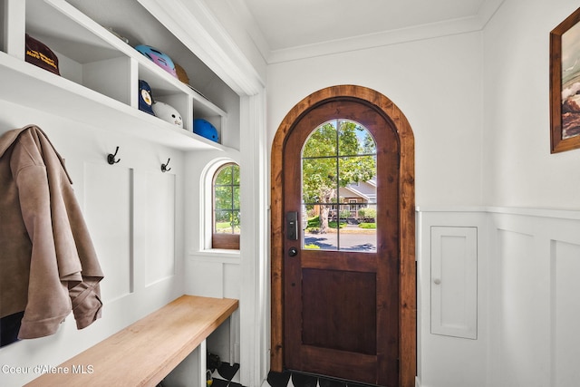 114 E Foster Ave, Coeur Dalene, ID 83814 - mudroom featuring a wainscoted wall, crown molding, and a decorative wall