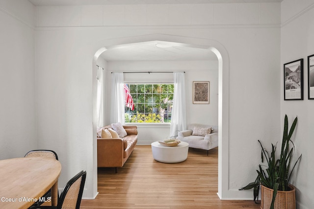 114 E Foster Ave, Coeur Dalene, ID 83814 - living room with arched walkways and wood finished floors