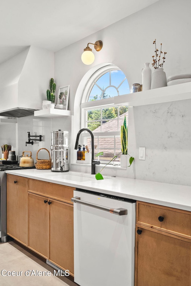 114 E Foster Ave, Coeur Dalene, ID 83814 - kitchen with dishwasher, light countertops, and stove