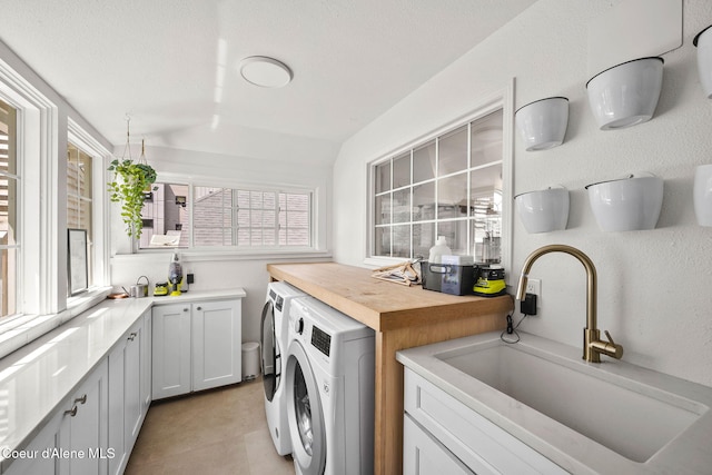 114 E Foster Ave, Coeur Dalene, ID 83814 - washroom with washer and dryer and cabinet space