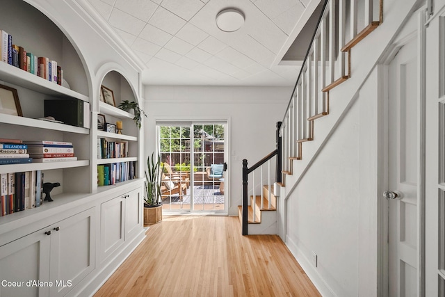 114 E Foster Ave, Coeur Dalene, ID 83814 - foyer entrance with light wood-style floors and stairs