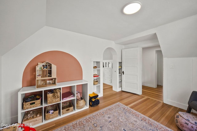 114 E Foster Ave, Coeur Dalene, ID 83814 - living area with wood finished floors and arched walkways