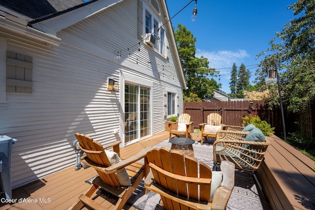 114 E Foster Ave, Coeur Dalene, ID 83814 - wooden deck with an outdoor hangout area