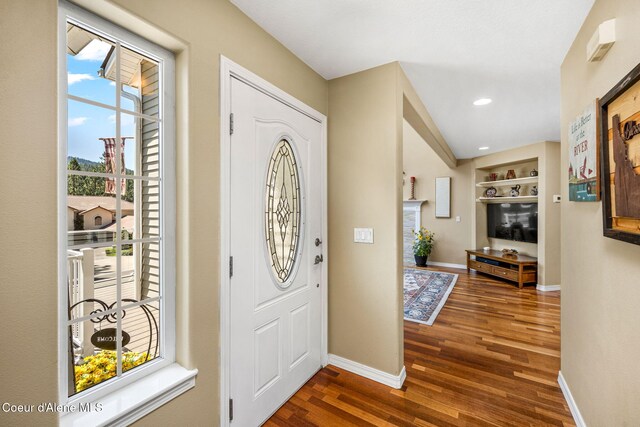 5570 E Shoreline Dr, Post Falls, ID 83854 - foyer featuring healthy amount of natural light, wood finished floors, and recessed lighting