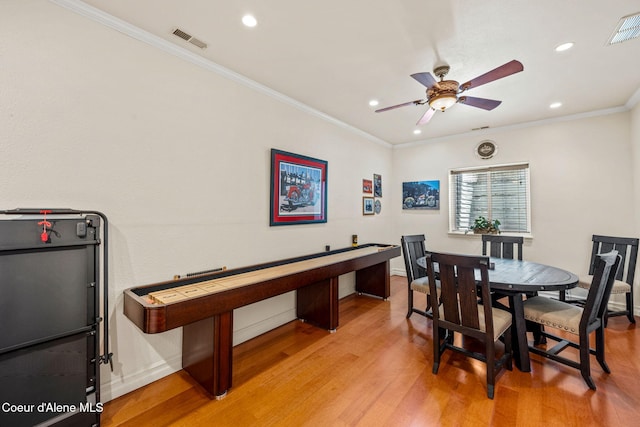 5570 E Shoreline Dr, Post Falls, ID 83854 - dining room featuring ceiling fan, light wood-style flooring, ornamental molding, and recessed lighting