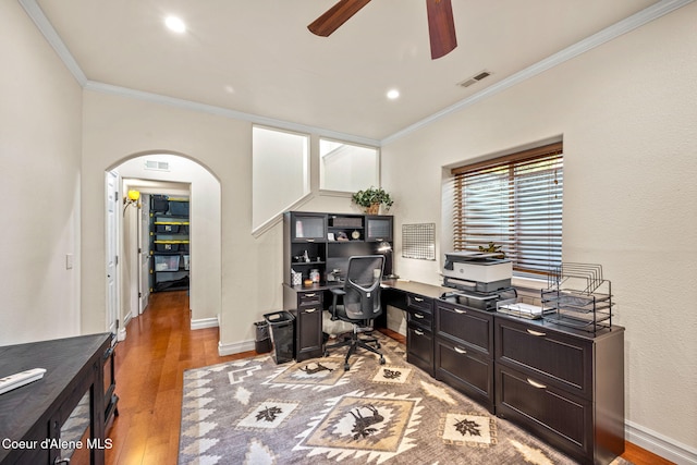 5570 E Shoreline Dr, Post Falls, ID 83854 - office area featuring ceiling fan, crown molding, arched walkways, light wood finished floors, and recessed lighting