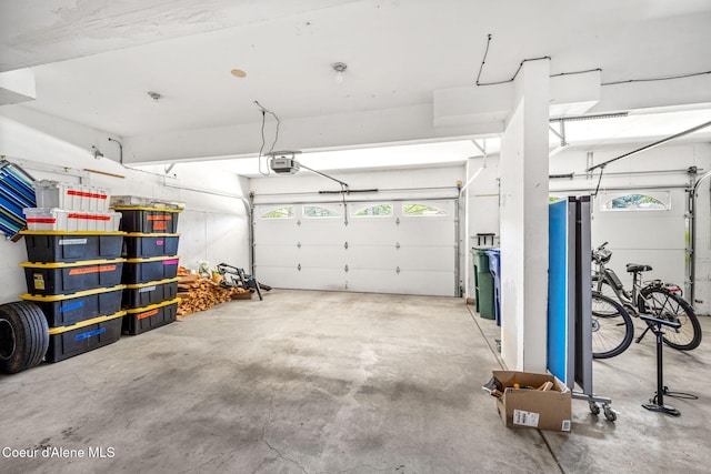 5570 E Shoreline Dr, Post Falls, ID 83854 - garage featuring a garage door opener