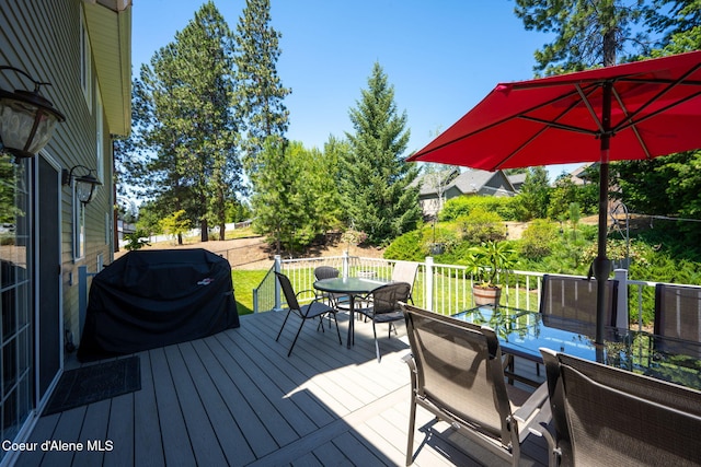 5570 E Shoreline Dr, Post Falls, ID 83854 - deck featuring outdoor dining space and area for grilling