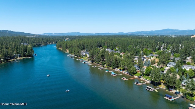 5570 E Shoreline Dr, Post Falls, ID 83854 - bird's eye view of a heavily wooded area and a water and mountain view