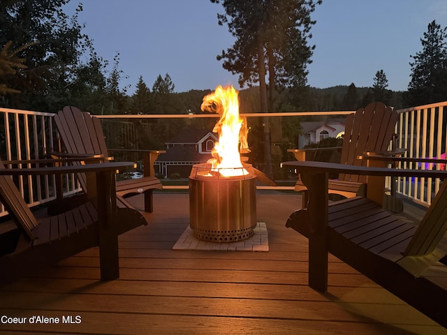 5570 E Shoreline Dr, Post Falls, ID 83854 - deck with an outdoor fire pit