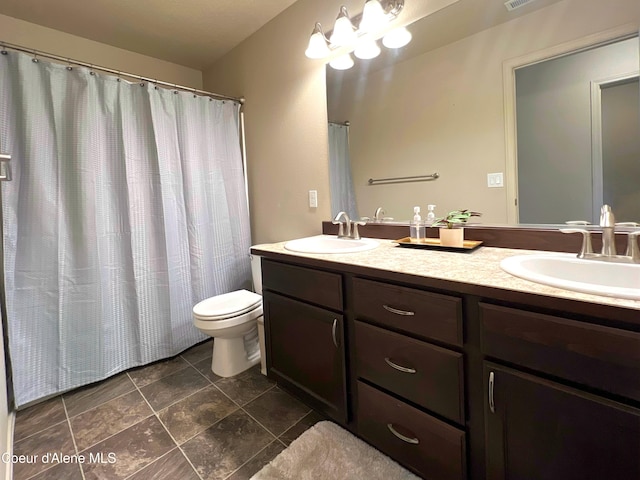 2699 E Thrush Dr, Post Falls, ID 83854 - full bathroom with double vanity and tile patterned floors